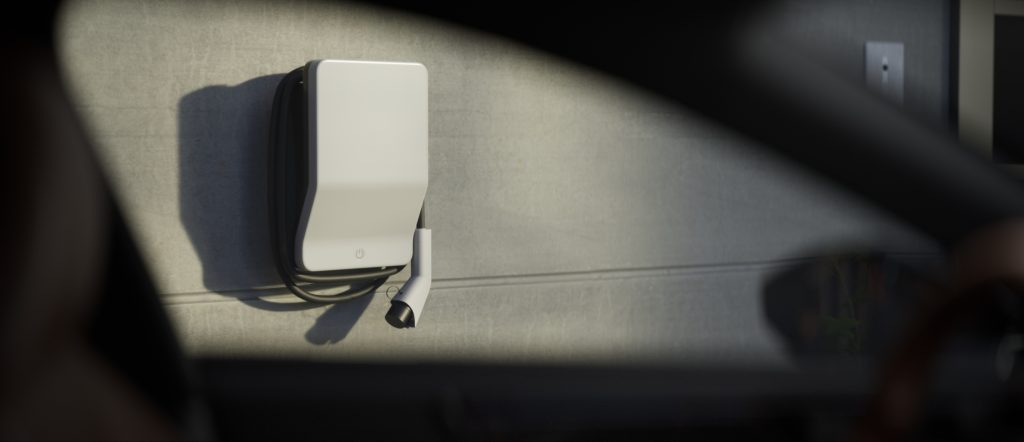 Borne de recharge vue à travers une fenêtre de voiture